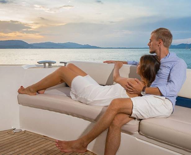 Couple watching the sunset on yacht Abama Hotels Couple watching the sunset on yacht Abama Hotels